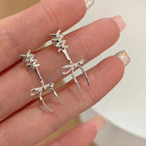 Fashion Design Silver Color Bow Tie Ribbon Stud Earrings For Women Exquisite Sweet Metal Hollow Line Earrings Jewelry Party