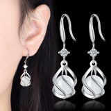Christmas Gift alloy New Women's Fashion Jewelry High Quality Zircon Round Opal Hollow Long Tassel Earrings